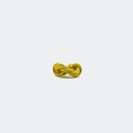 Gold knot cufflink on white background, minimalist jewelry accessory