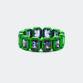 Green band ring with rectangular purple gemstones, modern jewelry on white background